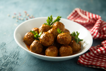 Meatballs with tomato sauce and parsley