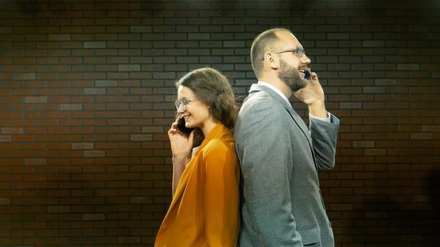 Man and woman are talking on the phone 02