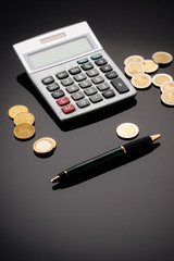 taschenrechner mit münzen