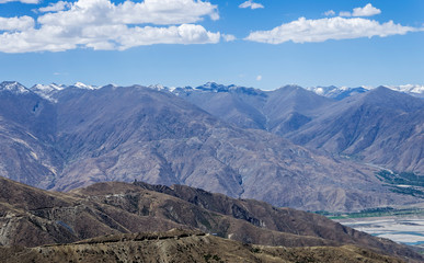 Desert and mountain over blue sky and white clouds on altiplano