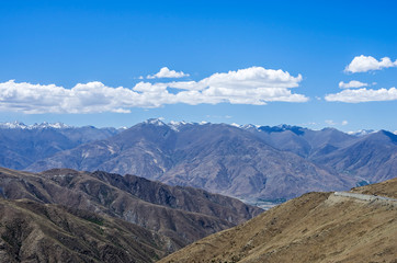 Desert and mountain over blue sky and white clouds on altiplano