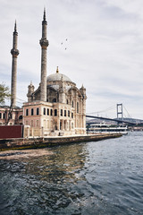Fototapeta na wymiar Ortakoy Mosque in Besiktas, Istanbul, Turkey, is one of the most popular locations on the Bosphorus.
