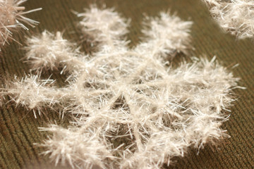 Big decorative snowflake silver tinsel. Christmas and New Year Decoration.