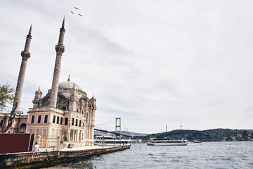 Fototapeta na wymiar Ortakoy Mosque in Besiktas, Istanbul, Turkey, is one of the most popular locations on the Bosphorus.