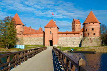 Fototapeta na wymiar Medieval castle of Trakai, Vilnius, Lithuania, Eastern Europe, located between beautiful lakes and nature with wooden bridge