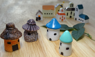 toy houses in autumn close-up leaves the design of the architecture abstraction city village