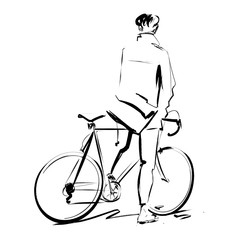 young man riding bike wearing messenger bag waiting in traffic