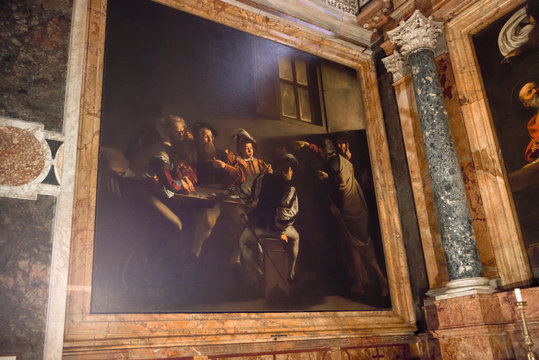 Caravaggio. Famous painting by the Italian painter in the church of Saint Louis of the French, Saint Matthew's vocation. Rome,Italy
