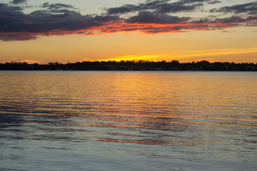 Obraz premium Swan river landscape at sunset