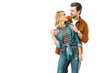 couple embracing and looking at each other isolated on white