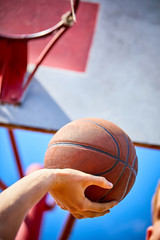 Fototapeta premium man holding a basketball
