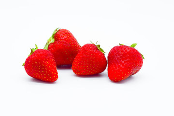 whole strawberries isolated on white background