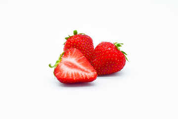 Strawberries isolated on white background, whole strawberries, cut strawberry