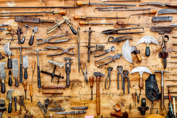 vintage tools on old wooden background