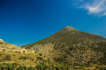 lonely mountain nature landscape in summer vivid warm sunny weather with blue sky background