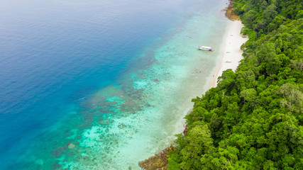Aerial top view beautiful tropical island with white sand beach and blue clear water, Top view above coral reef, Andaman sea, Myanmar.