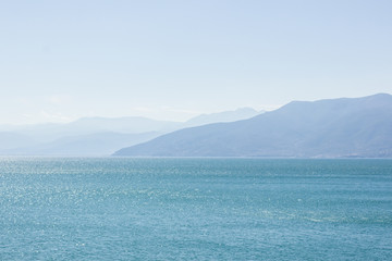 sea and mountains horizon silhouette beautiful nature scenic landscape and foggy weather