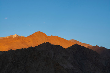 Mountain range with clear blue sky at twilight ,Leh, India