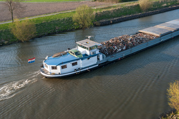 Naklejka premium Barge boat at Belgian Leie Canal