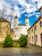 Fototapeta na wymiar Steinfeld Basilica, a former abbey church of Steinfeld Abbey, partial exterior view, at Steinfeld in Kall, North Rhine-Westphalia, Germany.