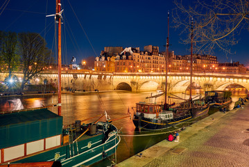 Barges on the Seine in Paris at night