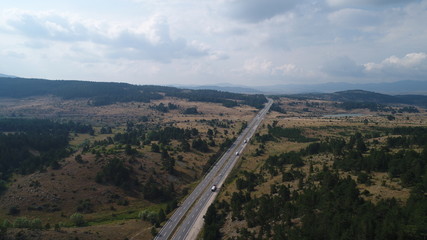 Road and forest in sunset.Aerial shot.