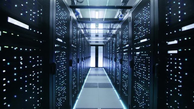 Looped Cinemagraph: Moving Through Endless Data Center with Server Racks Full of Blinking LED Lights.