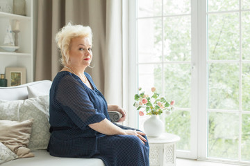 Portrait of beautiful senior woman at home