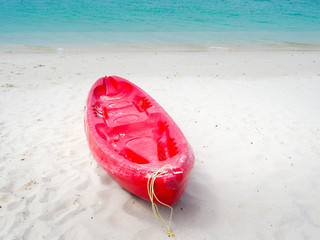 Beautiful sea and red canoe.