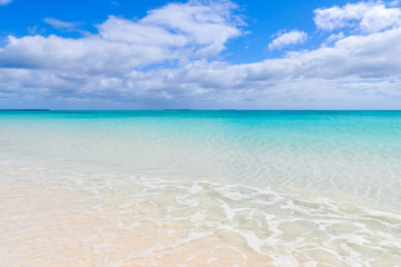 Tropical beach with fine white sand on Ouvea Island, New Caledonia. France.