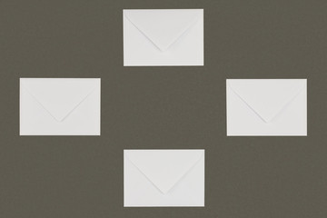 close-up view of closed white letters isolated on grey background