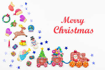 Obraz premium Merry Christmas greeting card with decorations. Santa, Christmas train with tree and sweets, snowman, reindeer and gifts
