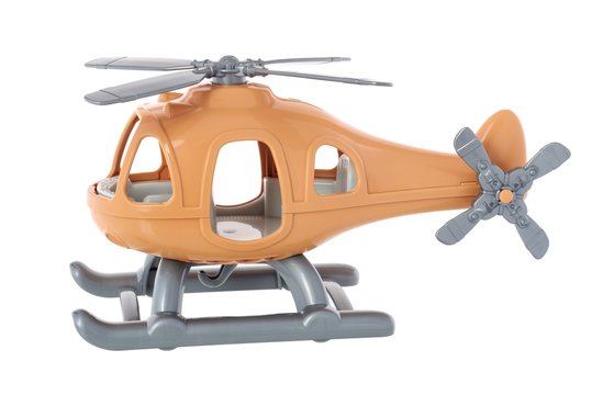 Plastic toy helicopter isolated on white background. Yellow helicopter.