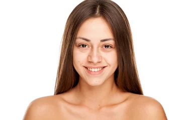 Poster Portrait of young beautiful happy woman with no makeup on white backgeound © vladimirfloyd