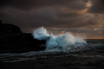 wave breaking on the rocks