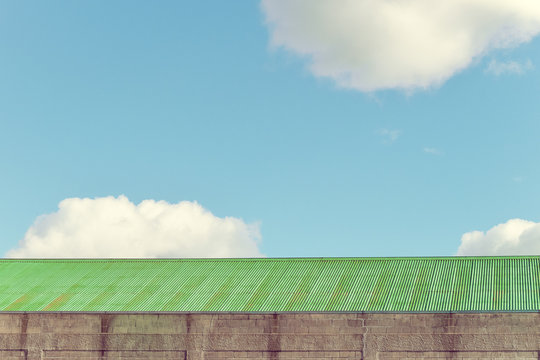 Green Iron Roof Against Blue Sky