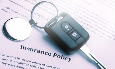 Key form car on Newspaper backdrop texture