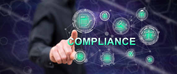 Man touching a compliance concept