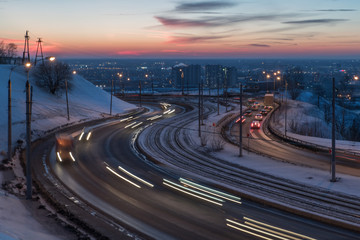 cars drive on the night road