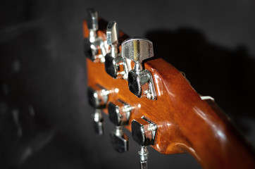 headstock with six tuning pegs