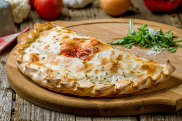 Closed calzone pizza
