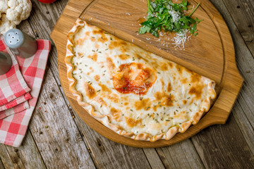 Closed calzone pizza