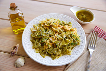 Farfalle pasta with Pesto on wood