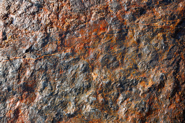 Stone texture in the beach shore with red