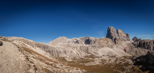 Awesome Cima Undici and Croda dei Toni peaks panorama in a summer day, South Tyrol, Italy