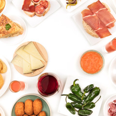 A photo of Spanish food, shot from the top. forming a frame on a white background with a place for text