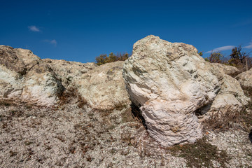 Quarry zeolite raw mineral  and stone wall.