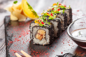 fresh sushi on rustic wooden table