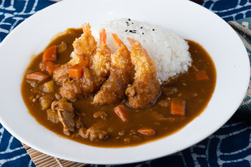 Japanese curry with fried shrimps.