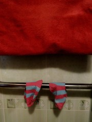 striped socks and a red towel